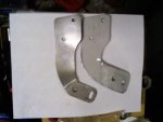 old & new steering bracket.jpg