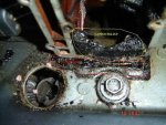 64' Evinrude  5.5-Dirty Cyls-Exhaust Cover Removed-Closeup Labeled.jpg