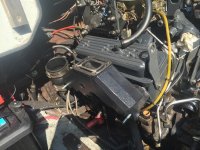 New exhaust on OMC V6 with longer bolts for alignment.jpg New exhaust on OMC V6 with longer bolts for alignment.jpg