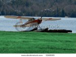 stock-photo-north-american-light-aircraft-with-pontoon-floats-seaplane-horizontal-framing-with-c.jpg