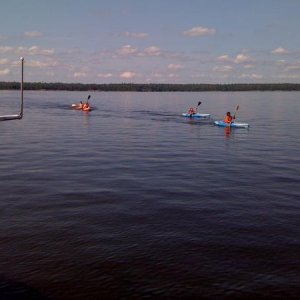 Kids on kayaks. Crossed the lake on a calm day.