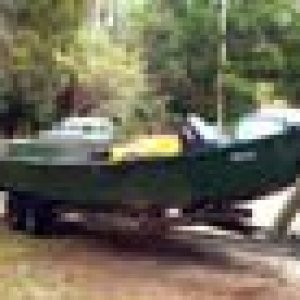 Forward motor mullet fishing boat