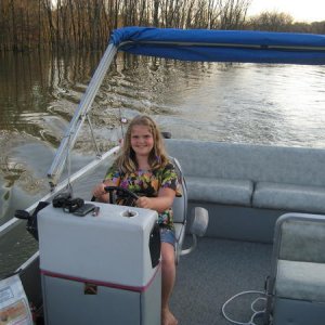 my daughter at the helm (big hollow lake, june 2010)