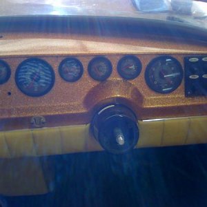 Gauges installed on dash.  When I got the boat, it had a surface mount speedo, located right about where that hole is. Nothing more.  My gauge placeme