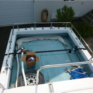 Cockpit sole painted with latex. Engine hatch covers have rotted wood.