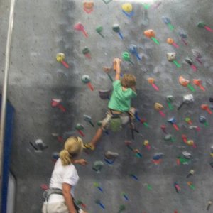 Haley belaying Kadry rock climbing in Chattanooga.