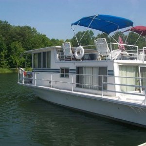 jypseygal...1969 32 ft Naualine houseboat that we keep in a state park in Chattanooga, Tn.