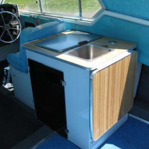 The new kitchenette with the ice box out and storage drawers put in