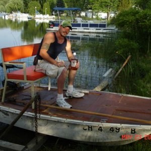 my brother and our spearing boat