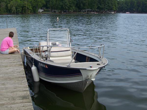 Finaly on the water.....The Admeral holds the dock lines while the lowley captian gets the trailer.