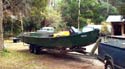 Forward motor mullet fishing boat