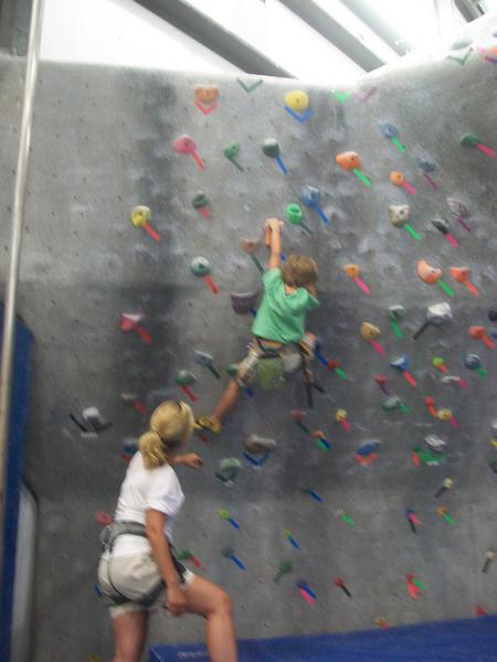 Haley belaying Kadry rock climbing in Chattanooga.