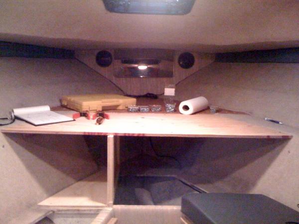 I removed all the carpet and fitted a 3/4" plywood to extend the platform to the edge of the seat base. This also provide extra storage.