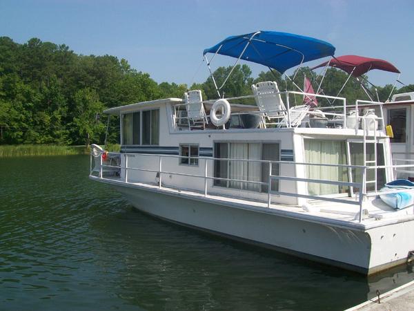 jypseygal...1969 32 ft Naualine houseboat that we keep in a state park in Chattanooga, Tn.