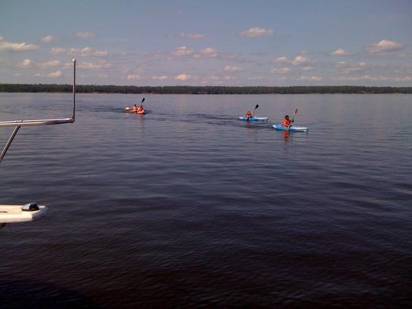 Kids on kayaks. Crossed the lake on a calm day.