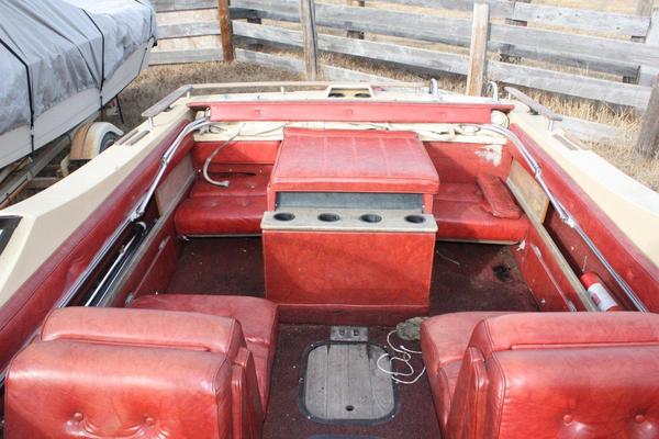 Notice the black rotted wood under the rear port seat?  From the back rest.