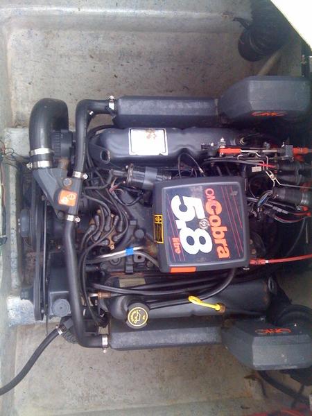 Re-powered OMC 5.8L in 2007 with a holley double pumper.