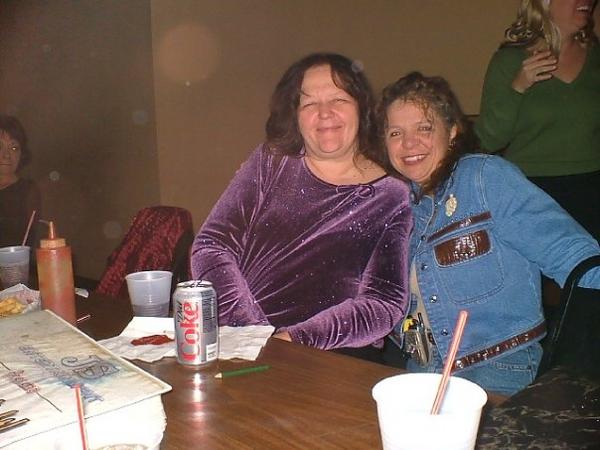 Teri and I at office Christmas party - I am in the blue!