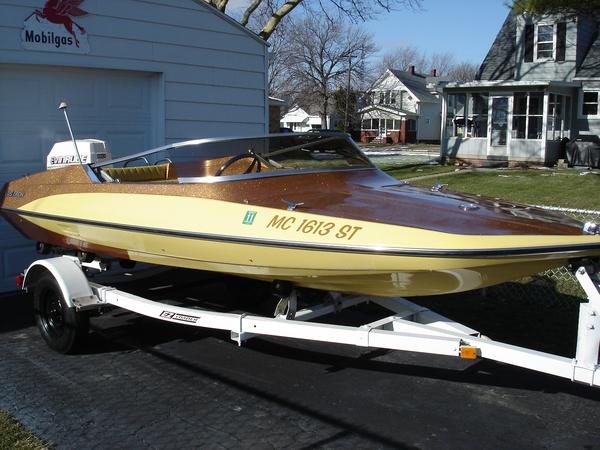 The '79 Glastron GT-150 my son gave me for my birthday July 2009. The motor is a '74 Evinrude 85 (w/o power trim).