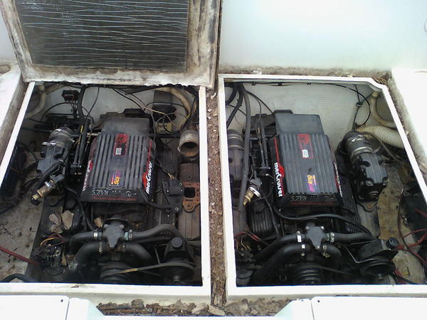 Twin 350s, replacing the riser an manafold on port motor