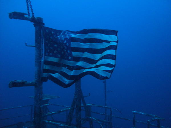 USA Flag underwater at the Miracle Of Life