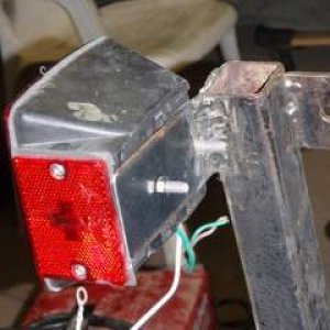 welded on additional "ears" to side guide supports for high mounted lights